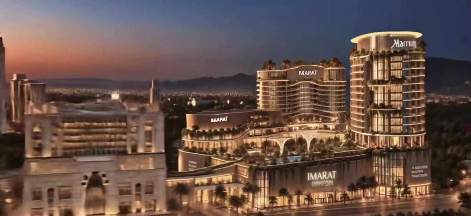 Hotel tower and mall frontage at dusk